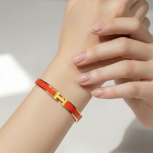 Elegant Gold and Orange Bracelet